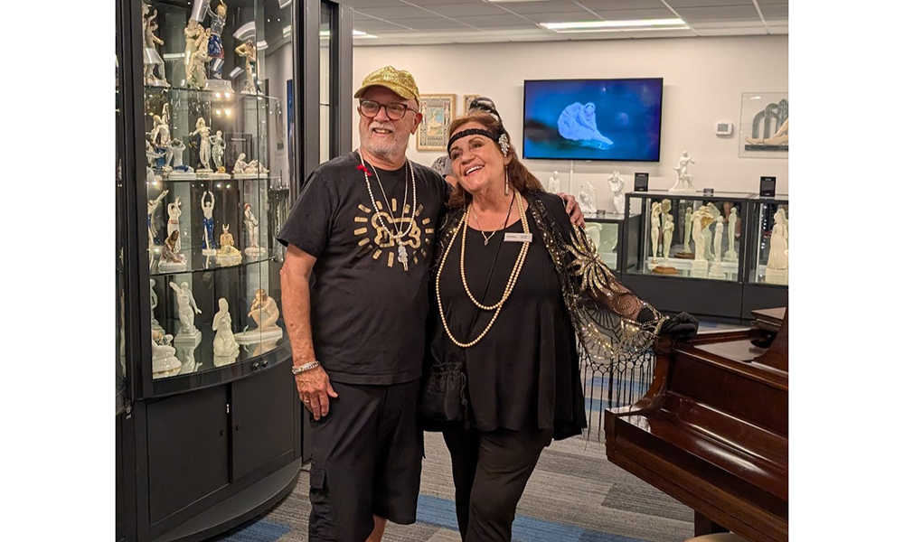 Claudia with guest in the Art Deco Gallery.