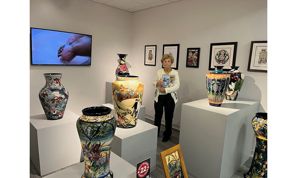 Volunteer Mary Brown with the Moorcroft Prestige Collection at WMODA
