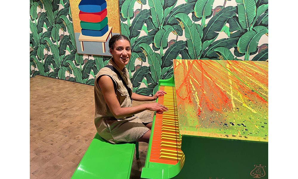 Ariana playing Chihuly's Steinway piano