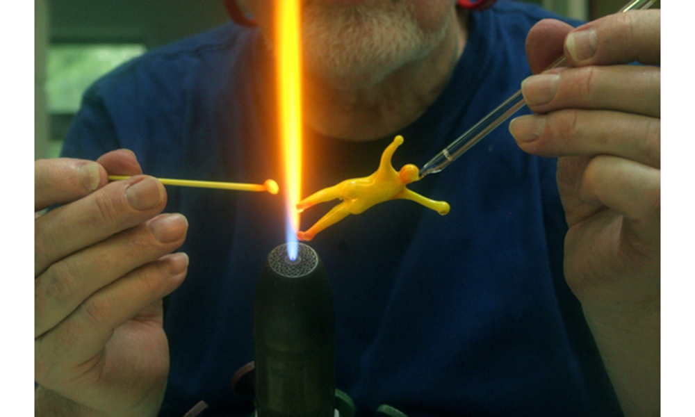 Paul Stankard making a root Person